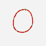 Gold filled bracelet with dark orange Czech glass beads and stretch fit design.