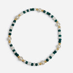 Green and white waterproof  bracelet with gold-filled beads and glass pearl accents.