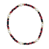Maroon and black waterproof bracelet with gold-filled beads and glass pearl accents.