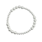 Sterling silver patterned beaded stretch bracelet with mixed bead sizes.