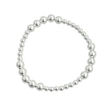 Sterling silver patterned beaded stretch bracelet with mixed bead sizes.