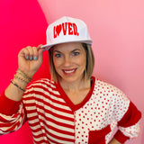 White LOVED embroidered baseball cap with heart detail and adjustable snapback closure