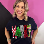 Black Christmas tee with patchwork Merry lettering and sequins.