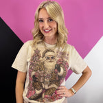 Cream Christmas tee with leopard Santa and rhinestone accents.
