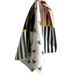 Crae Milk and Honey reversible microfiber hand towel, 19x29 in, striped front and cream bee print back.