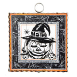 Smiling jack-o'-lantern in witch hat with pumpkins, spider, and spiderweb border with orange scalloped edge