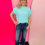 Mint raised ribbed cap sleeve top with boat neckline and relaxed boxy silhouette