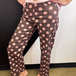 Mocha cotton twill pants with oversized pink polka dots and wide straight legs.