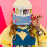 Mother patchwork hat with blue bill, star details, and pink snapback.