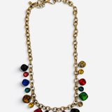 Gold-tone chain necklace with multicolor faceted crystal drops.