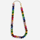 Gold-tone necklace with multicolor faceted teardrop crystals in vibrant jewel tones.