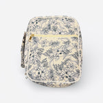 Navy quilted floral Bible case with zipper closure, carrying handle, and interior organizer pockets.