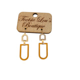 Orange & White Latch Earrings with gold post and orange dangle. Bold and stylish accessory for any occasion.
