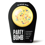 Yellow bath bomb with sprinkles and pineapple scent, includes hidden surprise inside.