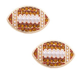 Shiny gold football stud earrings with sparkling pavé accents.