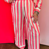 Pink striped wide leg lounge pants with contrast side panels.