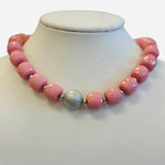 Chunky bubblegum pink faceted bead necklace with silver tone spacers and focal bead
