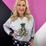 Grey Christmas pullover with green tree, black polka dot bow and matching trim.