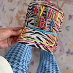 Animal print Easy There Tiger hat with colorful embroidery and bright blue rope trim.