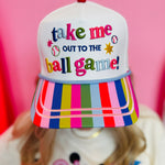 White baseball hat with colorful embroidery, striped bill, and ballpark-themed details.