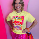 Yellow tee with colorful fish graphic, stripes, and star accents.