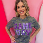 Purple Game Day tee with patchwork appliqué lettering and mixed purple print details.