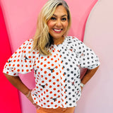 Queen of Sparkles Texas mascot colorblock polka dot button-up top with puff sleeves.