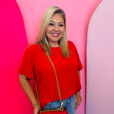 Ruby red boat neck top with rolled sleeves and relaxed fit