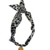 Gray Scarf Necklace with black leopard spots, knotted design, sunburst charm, and crystal center.