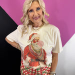 Cream Santa graphic tee with rhinestones, pink bubblegum, and jeweled holiday accents.