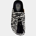 Shu Shop Ariana zebra print hair-on mule with black fringe and adjustable buckle.