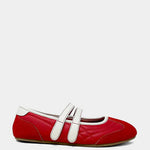 Red Mary Jane flats with double strap design.