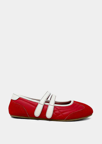 Red Mary Jane flats with double strap design.
