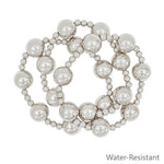 Set of three silver stretch bracelets with 14mm ball beads and 5mm beaded accents.