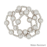 Set of three silver stretch bracelets with 14mm ball beads and 5mm beaded accents.