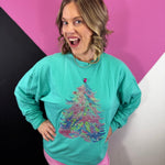 Turquoise Christmas top with pastel tree, dimensional jewels, and colorful sparkling accents.