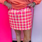 Plaid skort with built-in shorts, drawstring waist, pockets, and lightweight stretch fabric for summer wear.