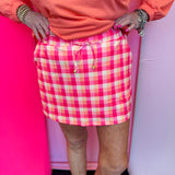Plaid skort with built-in shorts, drawstring waist, pockets, and lightweight stretch fabric for summer wear.