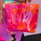 Glossy tote bag with hot pink, coral, orange, and fuchsia confetti print