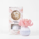 Sweet Grace flower diffuser with blooming pink flower and signature fragrance scent.