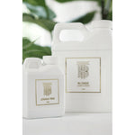 Thomas Blonde - small, 4oz travel-sized bottle of Laundry Detergent.