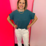 Teal raised ribbed cap sleeve top with boat neckline and relaxed silhouette