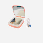 Pink compact mirror with LED light and built in power bank