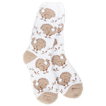 World’s Softest Socks brand white crew socks with small brown turkeys and tan heels and toes