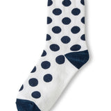 White polka dot socks with navy heel and toe accents