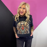 Black Thanksgiving tee with Western turkey, leopard details, sunglasses, and turquoise necklace.
