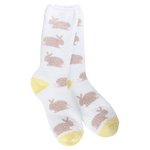 White cozy crew socks with beige bunny print, pink daisies, and yellow heel and toe accents