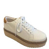 Ivory espadrille sneaker with jute flatform sole, tan heel detail, and lace-up design.