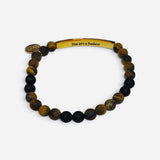 Brown and black natural stone bracelet with engraved You Are A Badass message.