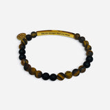 Brown and black natural stone bracelet with You Are Stronger Than You Think engraved message.